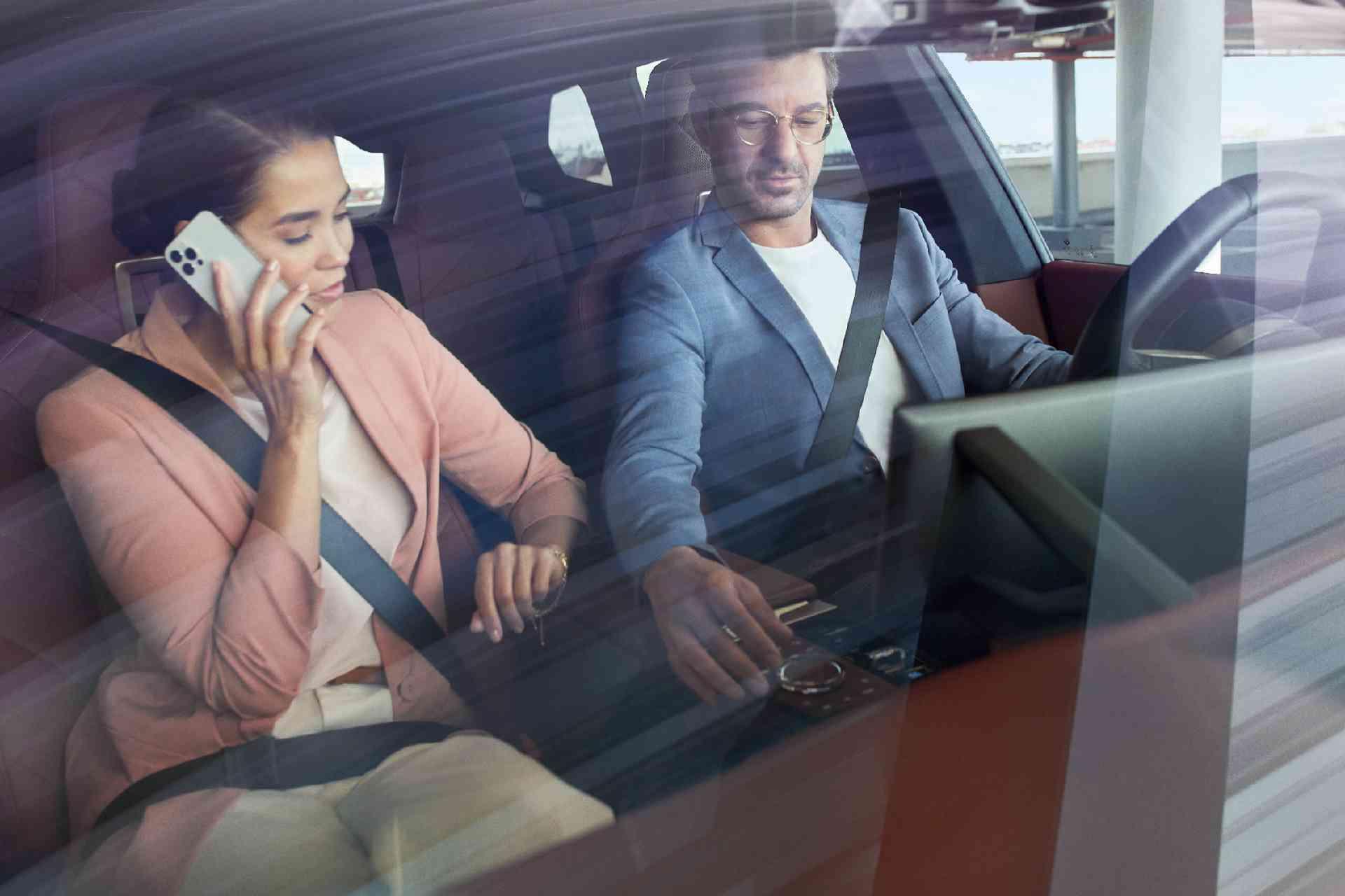 business-man-woman-car-inside